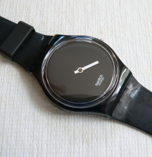 http://www.swatchandbeyond.com/published/publicdata/SHOPDATA/attachments/SC/products_pictures/swatch%20black%20minute%201_enl.JPG